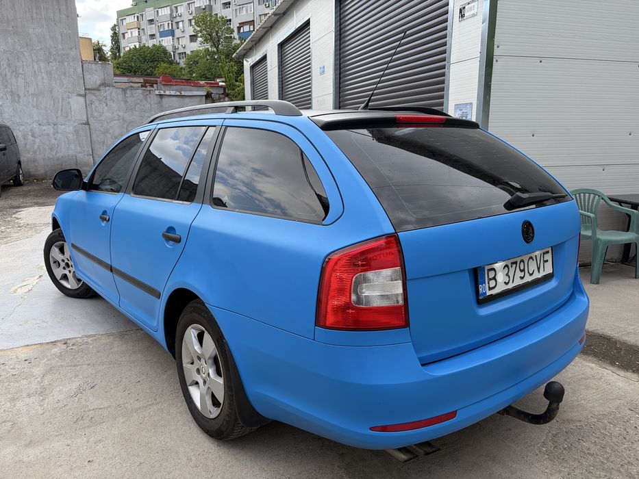 Skoda Octavia Break 1.6 Diesel (4x4) – An 2011, 110 CP, Cutie 6 Trepte, Colantată Albastru Mat - Imagine 4