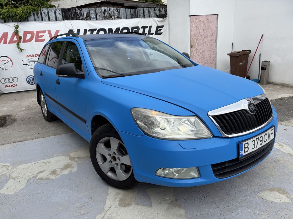 Skoda Octavia Break 1.6 Diesel (4x4) – An 2011, 110 CP, Cutie 6 Trepte, Colantată Albastru Mat - Imagine 2