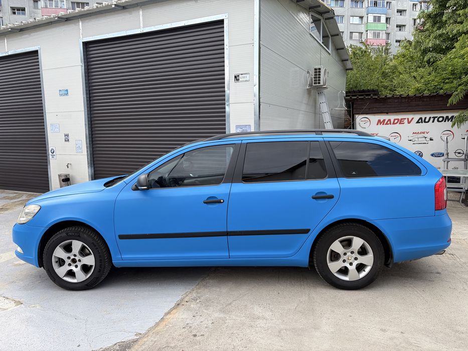 Skoda Octavia Break 1.6 Diesel (4x4) – An 2011, 110 CP, Cutie 6 Trepte, Colantată Albastru Mat - Imagine 5